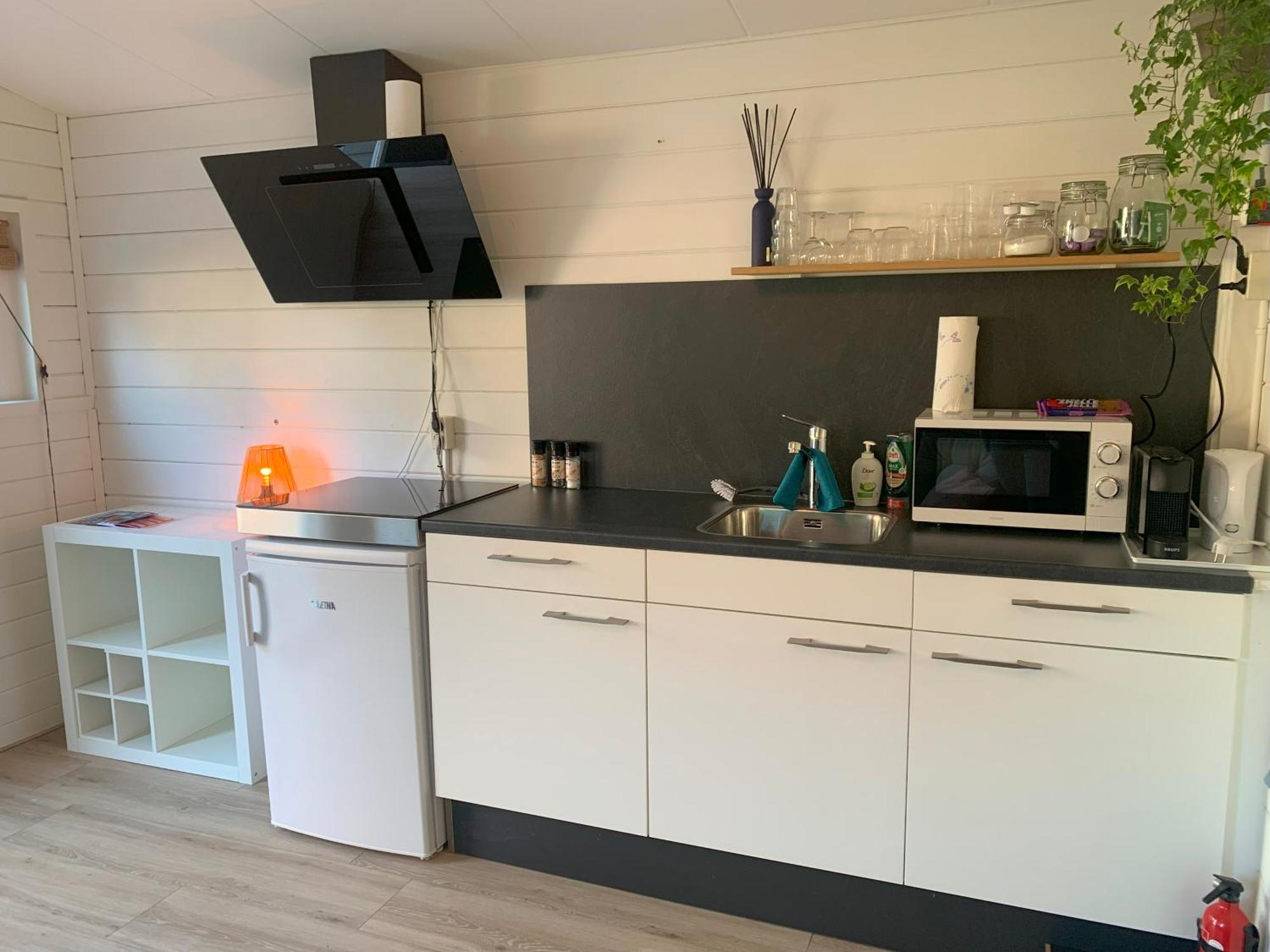 Tiny House Tussen De Grachten สเนก ภายนอก รูปภาพ